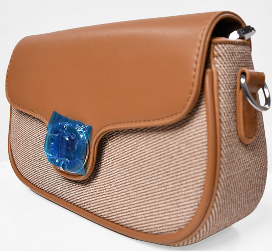 Elegant textured light brown clutch bag with silver clasp and leather trim