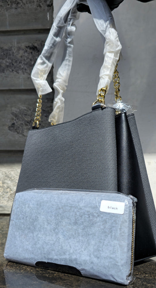 Chrisbella black canvas tote with leather panels, gold chain strap, and matching pouch