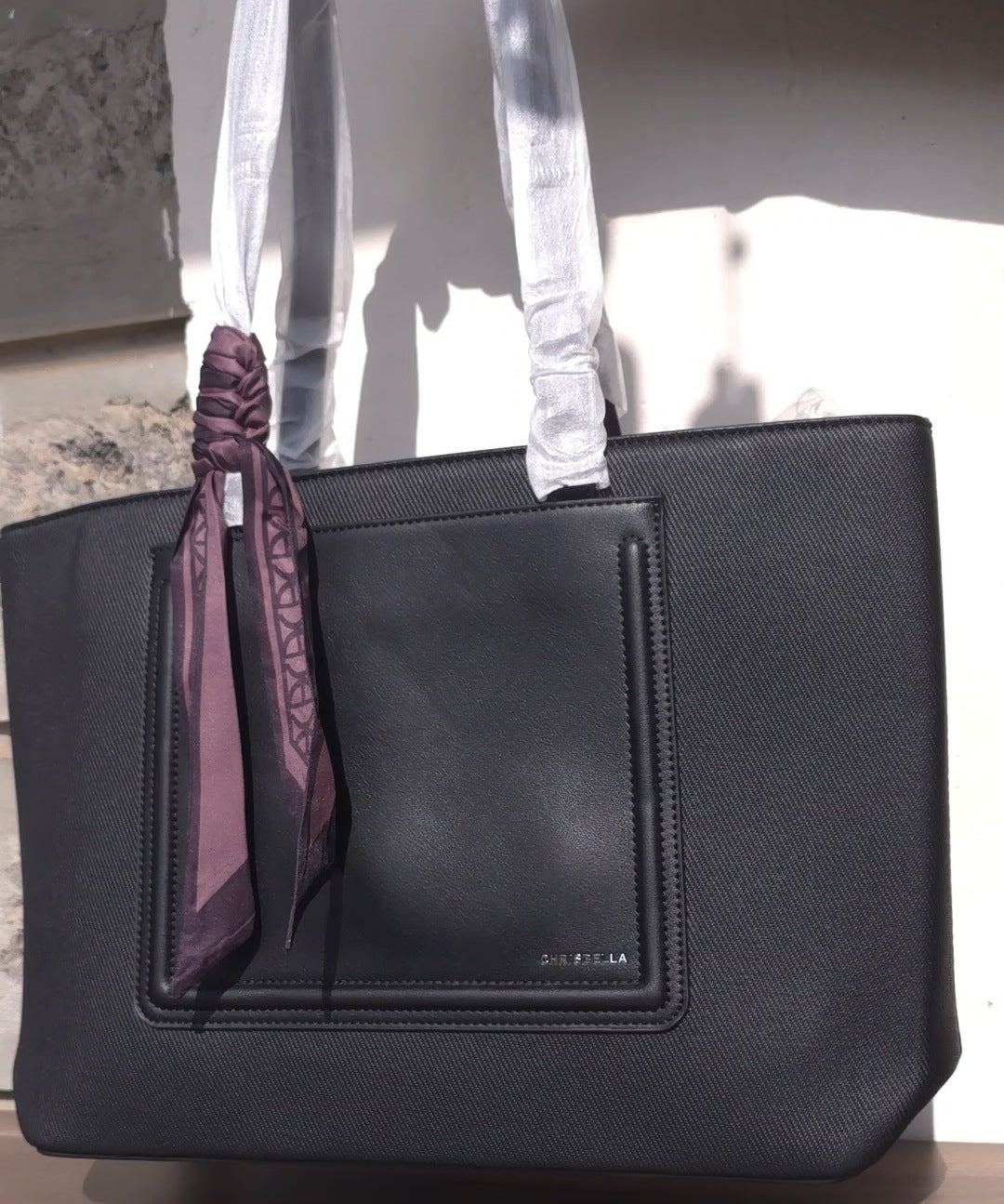 Chrisbella black canvas tote bag with leather handles and leather center patch
